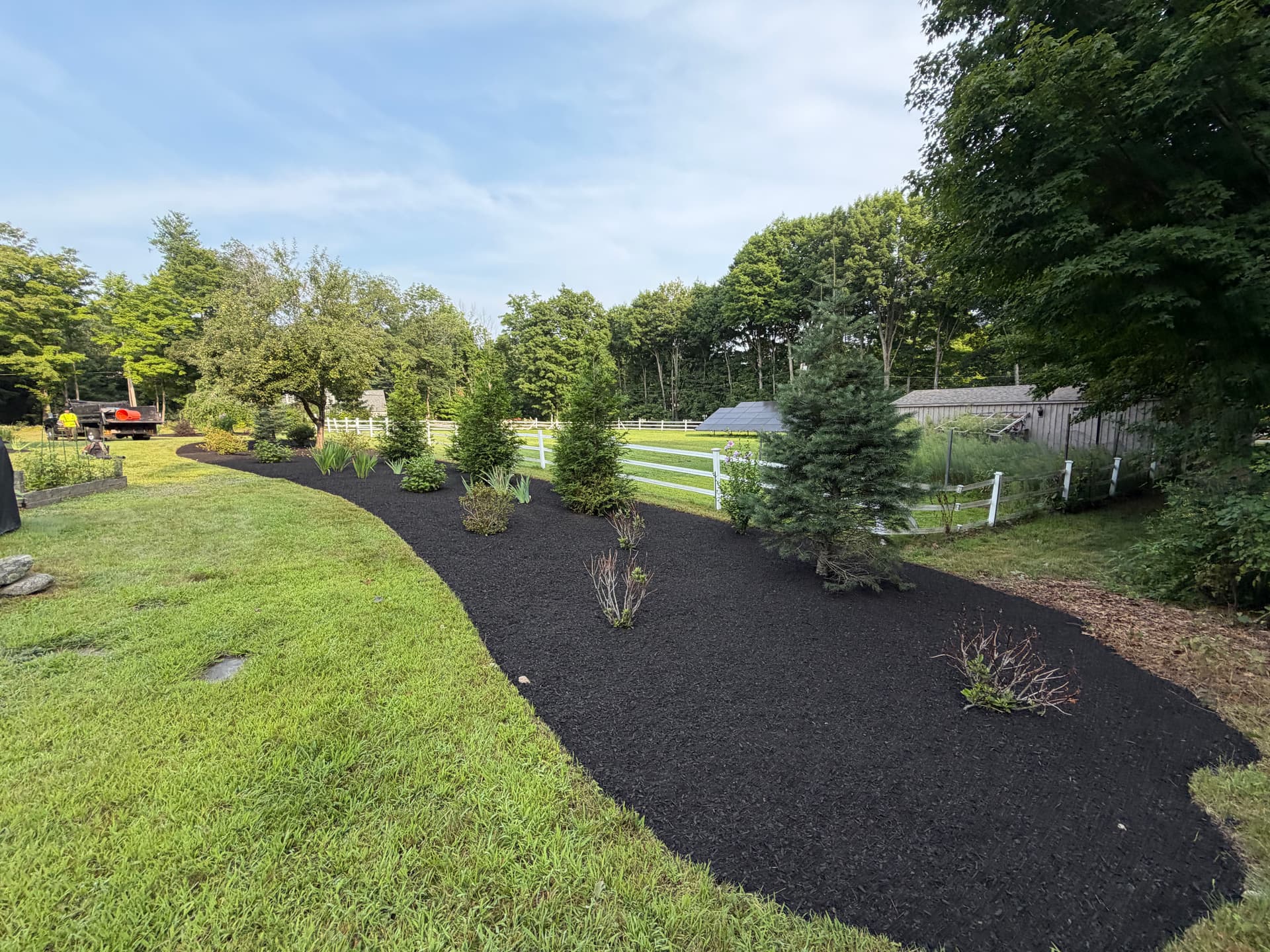 20 Yards of Black Mulch Laid Across a Sutton MA Property
