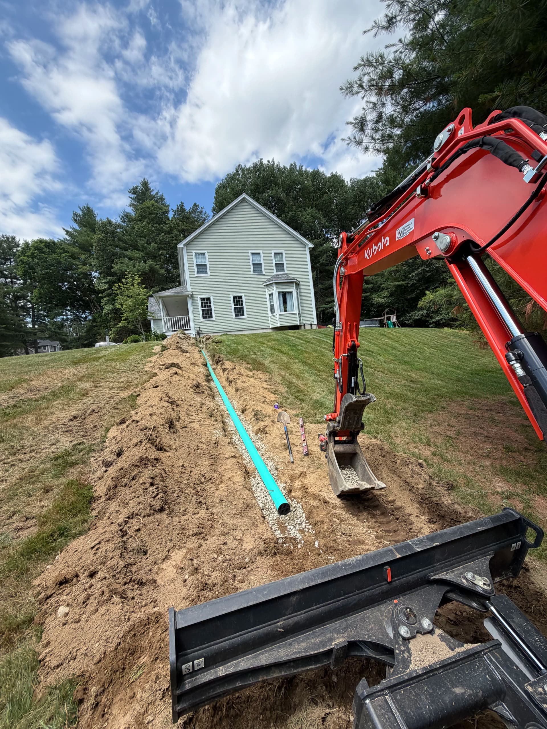 Gallery photos for Downspout Drainage Fix Keeps This Upton Home Dry: Image #1