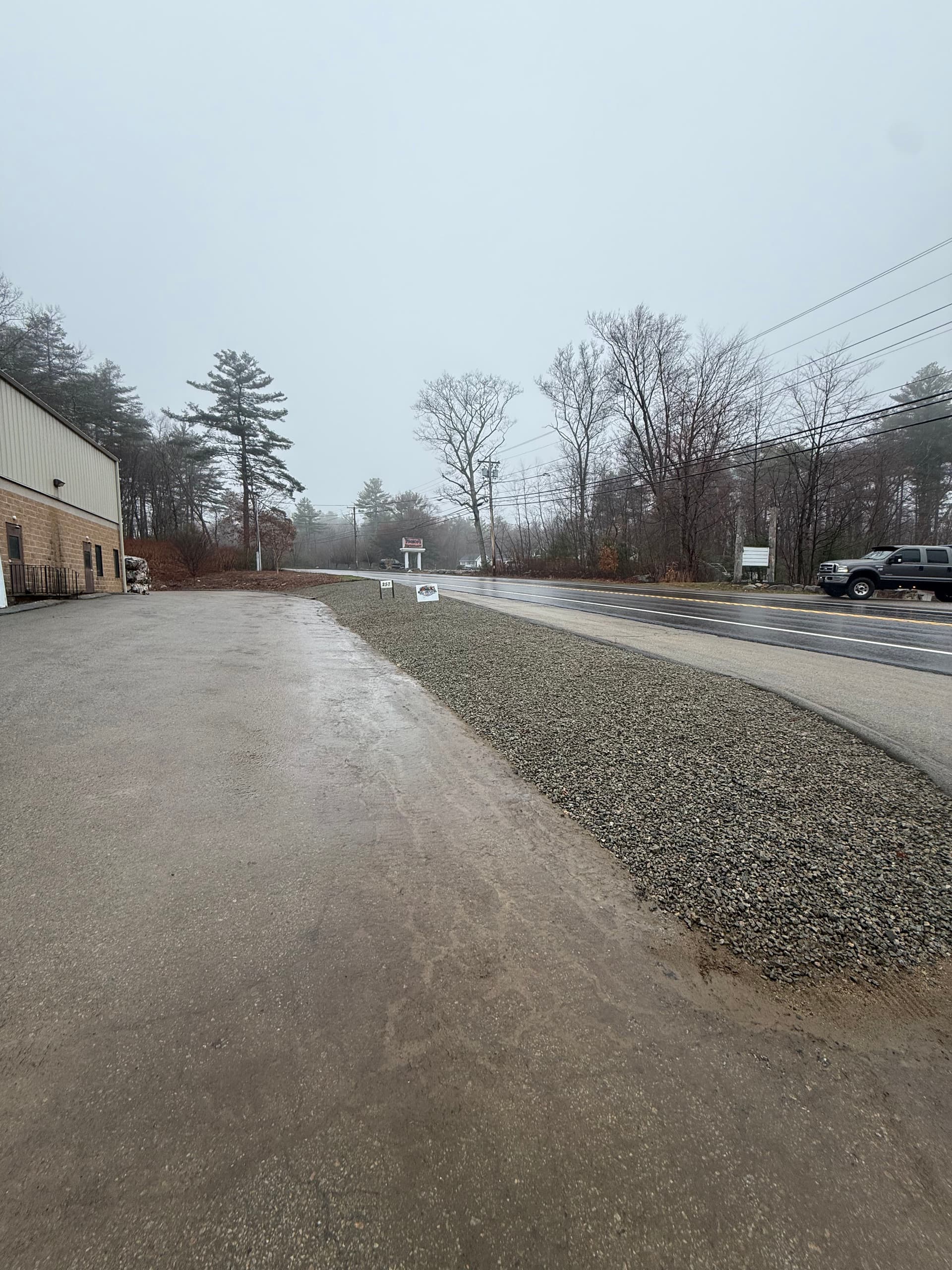 Gallery photos for Cracked Commercial Lot Gets a Clean 3/4 Stone Bed Makeover: Image #1