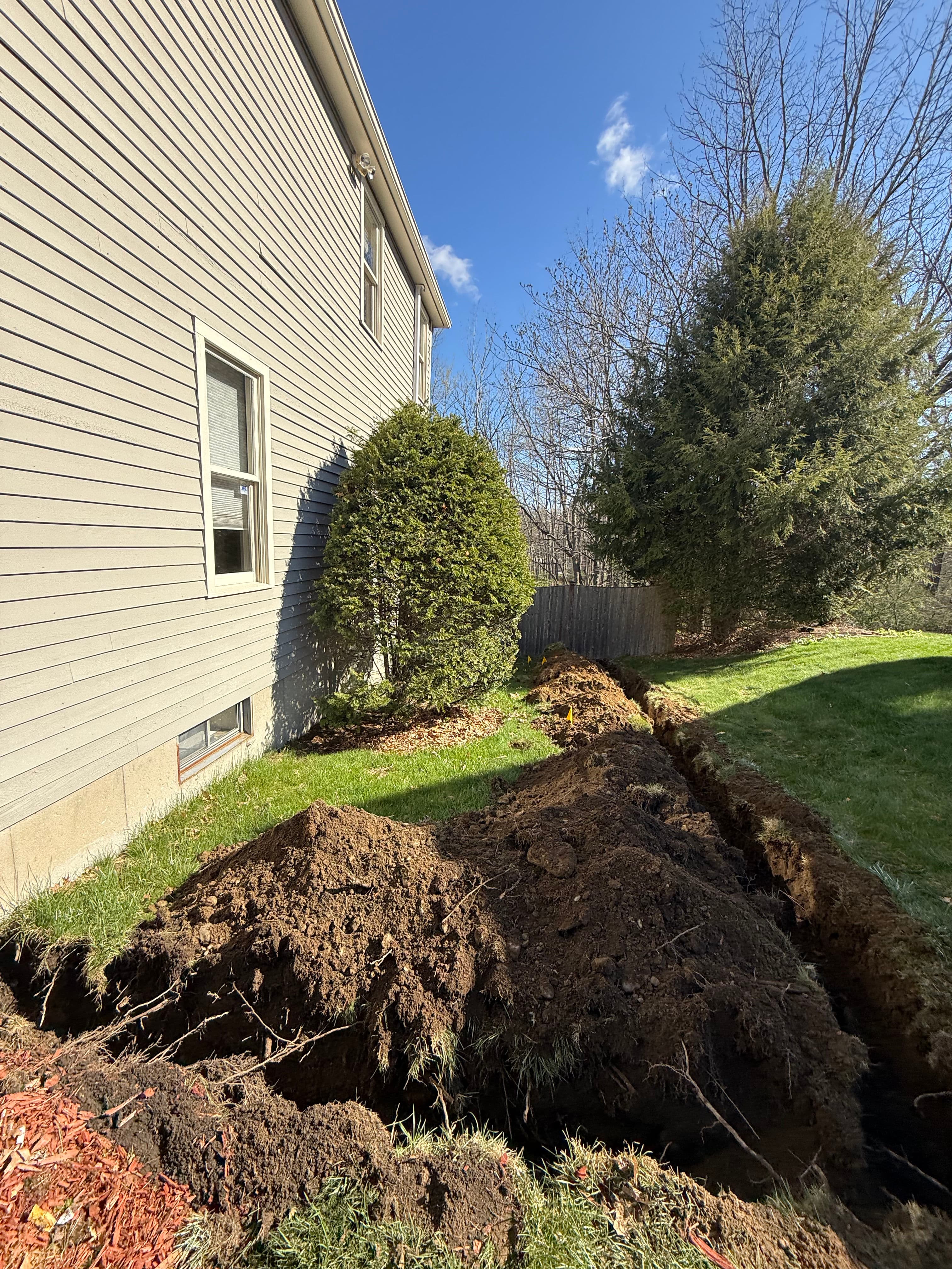 Project Foundation drainage fix that helped a home pass inspection in WestboroughMA image