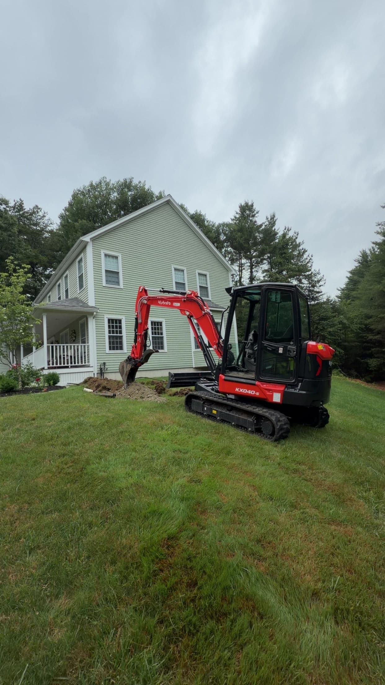 Project Downspout Drainage Fix Keeps This Upton Home Dry image