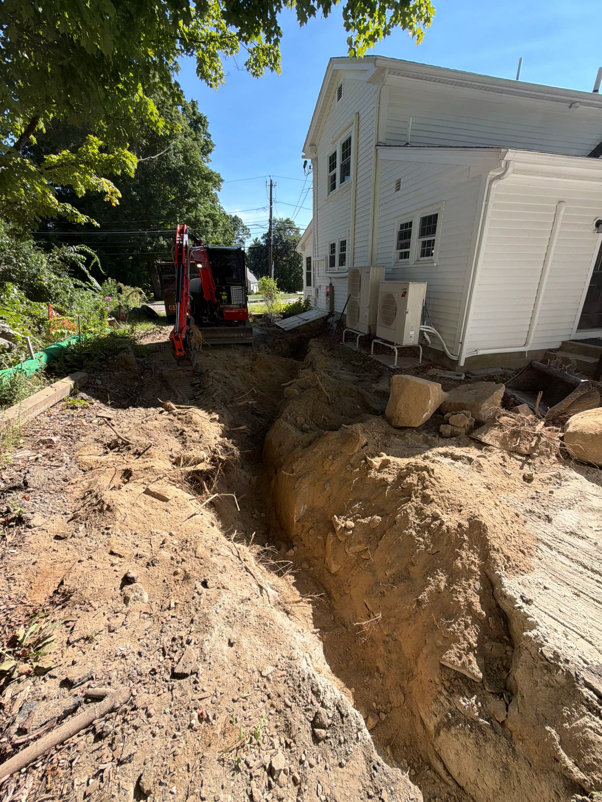 Electrical Trench Dug Through Rocky Ground in Medway MA