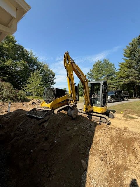 Drainage Solutions and Temporary Driveway Installation for Renovated Home