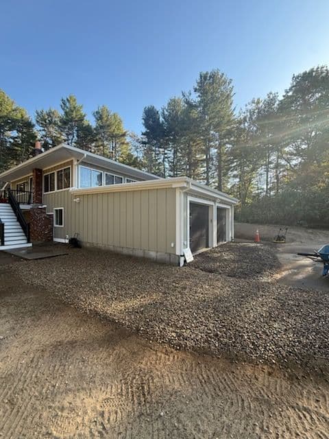 Drainage Solutions and Temporary Driveway Installation for Renovated Home